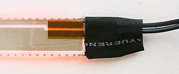 back of the el tape with wires attached