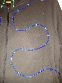 hoops sewn onto clothing to hold glowing el wire
